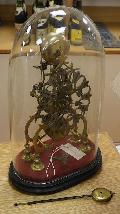 A Victorian brass framed skeleton clock, under a glass dome, 44cm